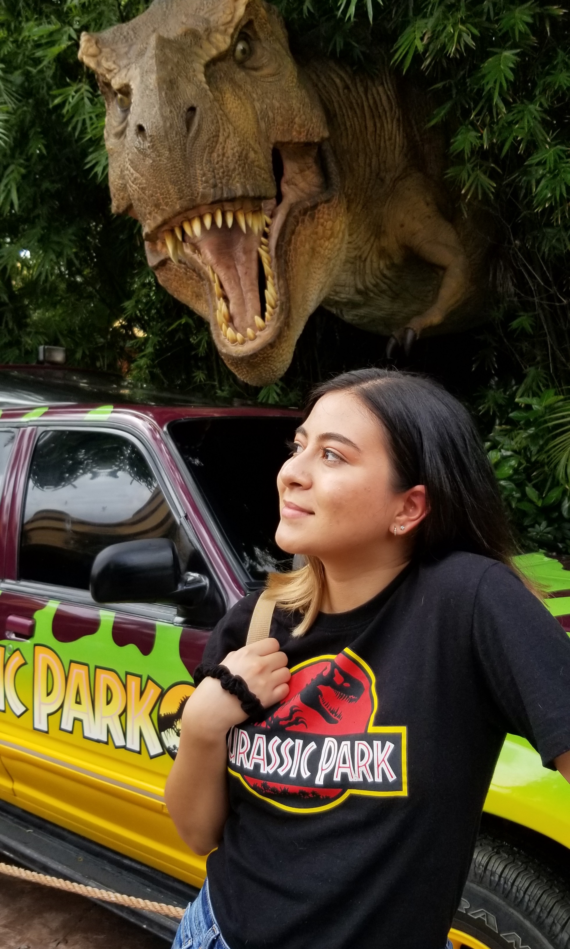 Carina with a T-Rex in Universal Studios Orlando
